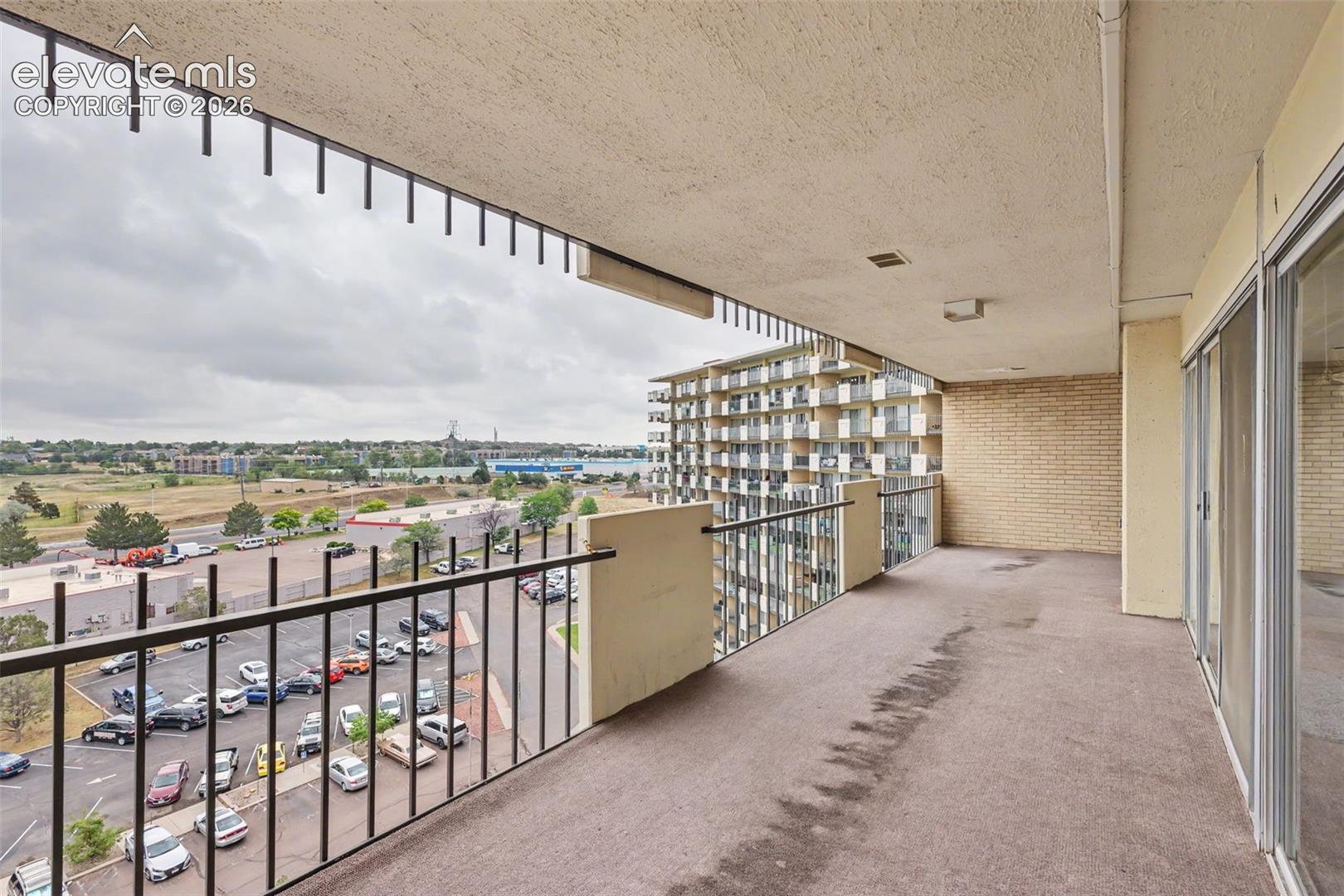 The large covered balcony provides the home's homeowners to enjoy the opportunity to enjoy the great outdoors from the comfort of home!