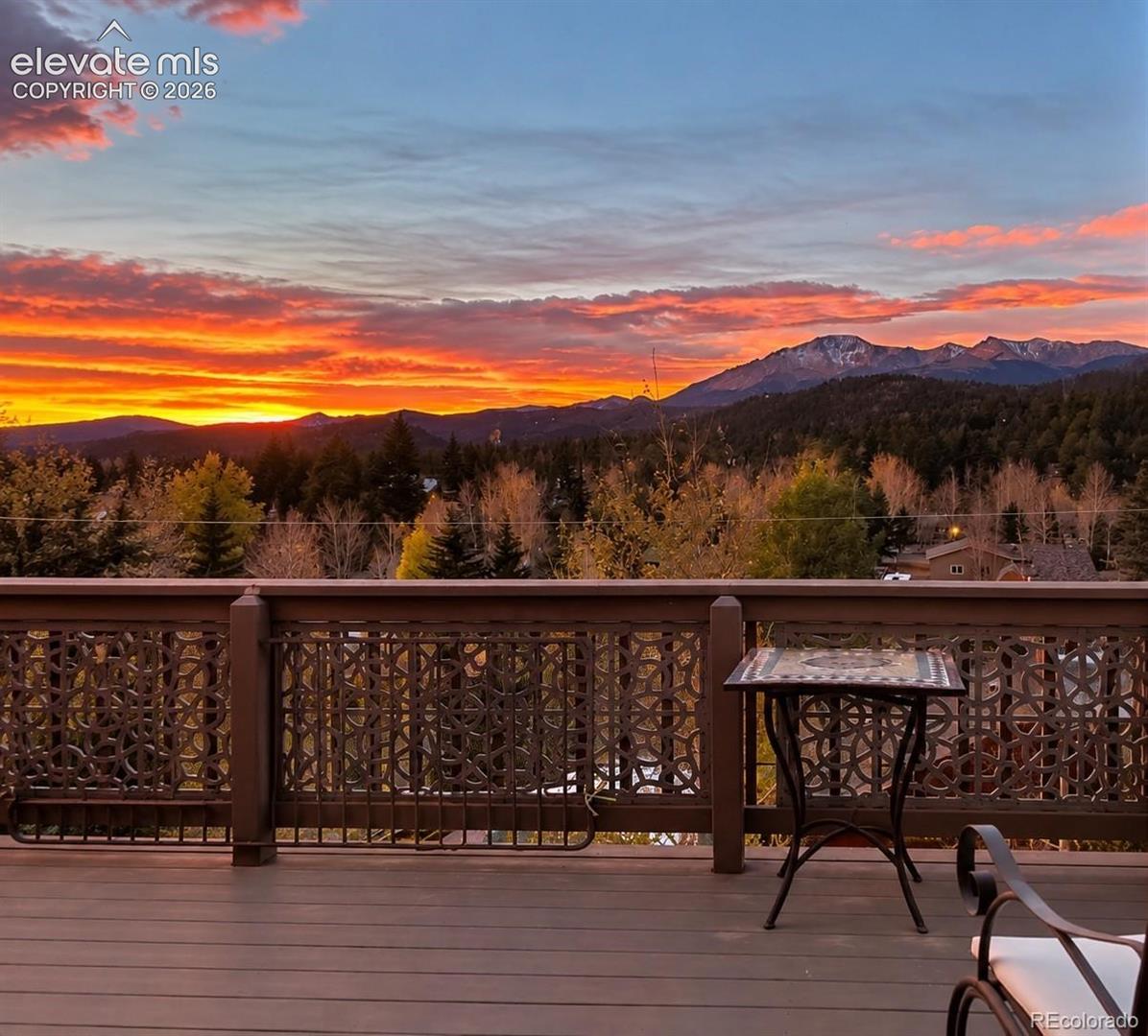 Expansive deck with composite decking and decorative metal railings