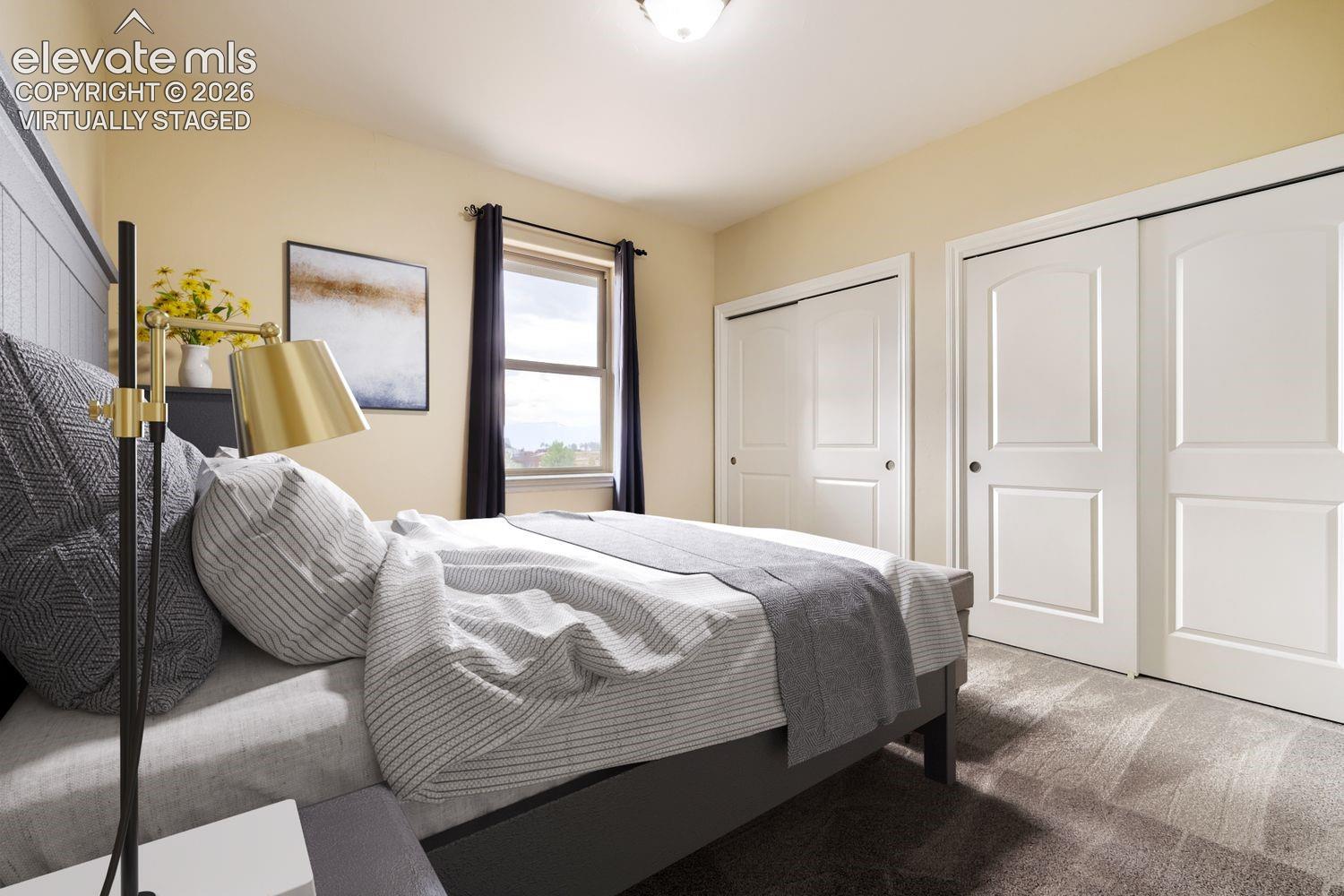 Virtually Staged - one of three main floor bedrooms.
