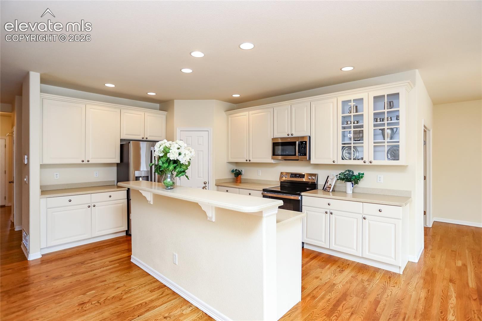 This gorgeous kitchen is the heart of the home offering ample cabinet and counter space!