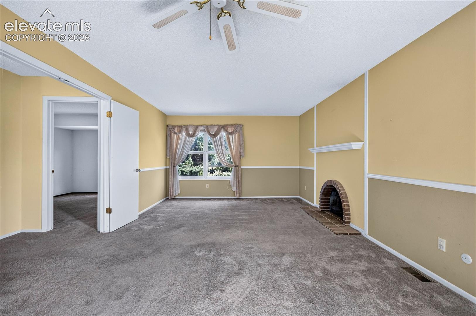 Large primary has wood burning fireplace