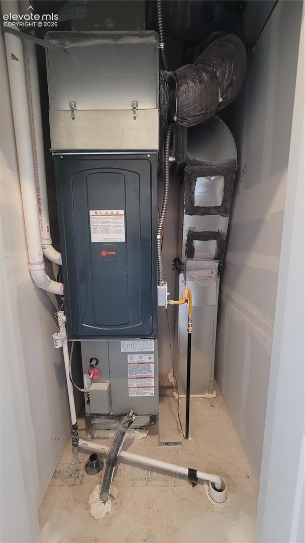 Utility closet with a 96% energy efficient furnace, located on the upper level! 