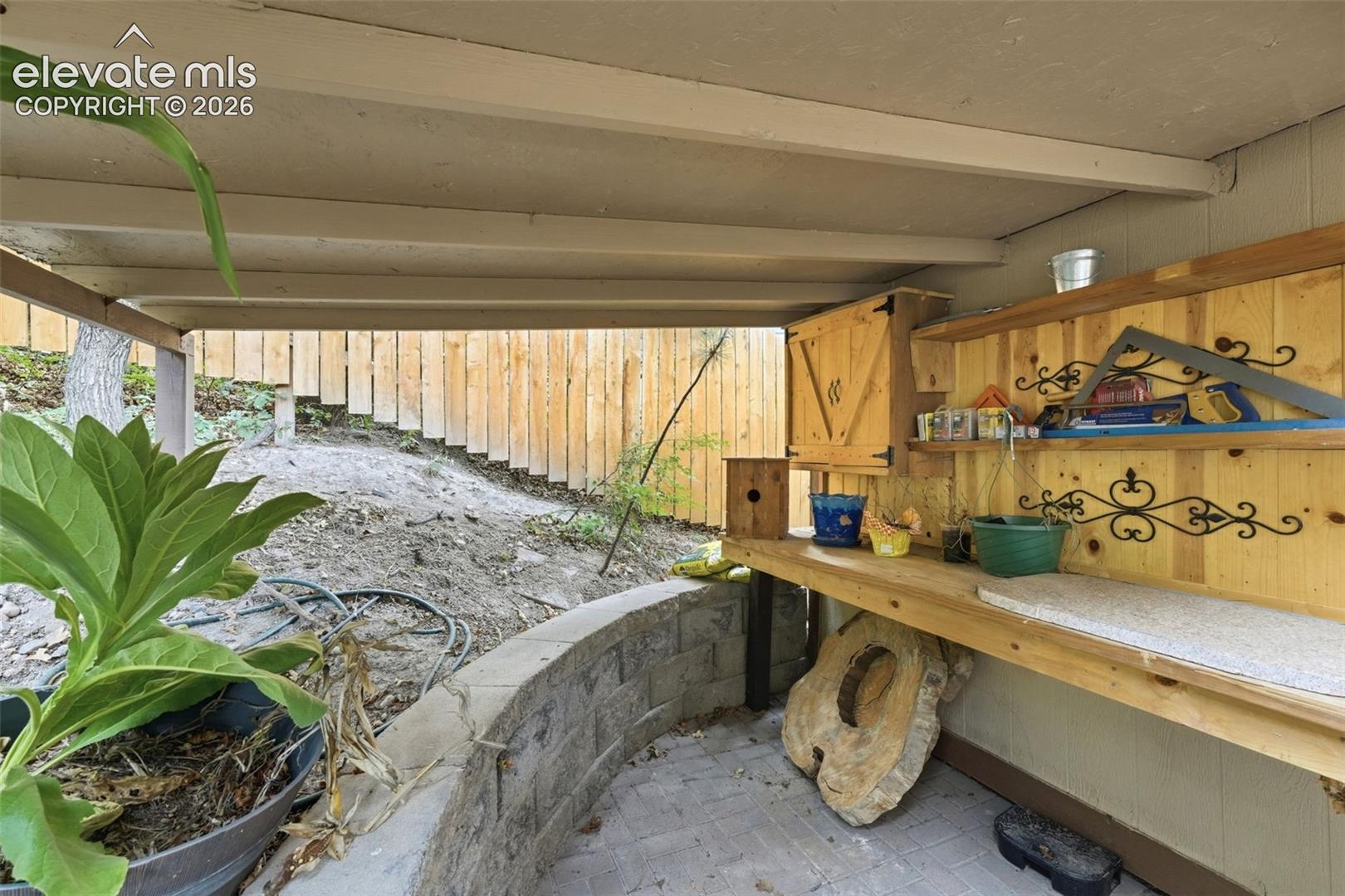 charming, covered outdoor potting shed, perfect for the gardener in all of us 