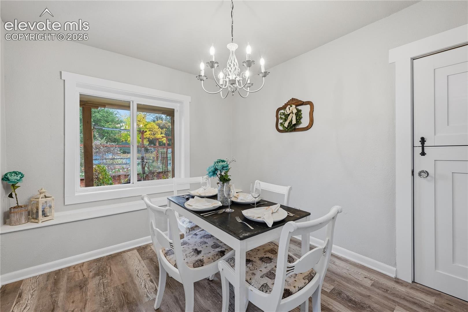 Another view of the dining room. The door to the right is a Dutch door that locks to separate the 2 units.