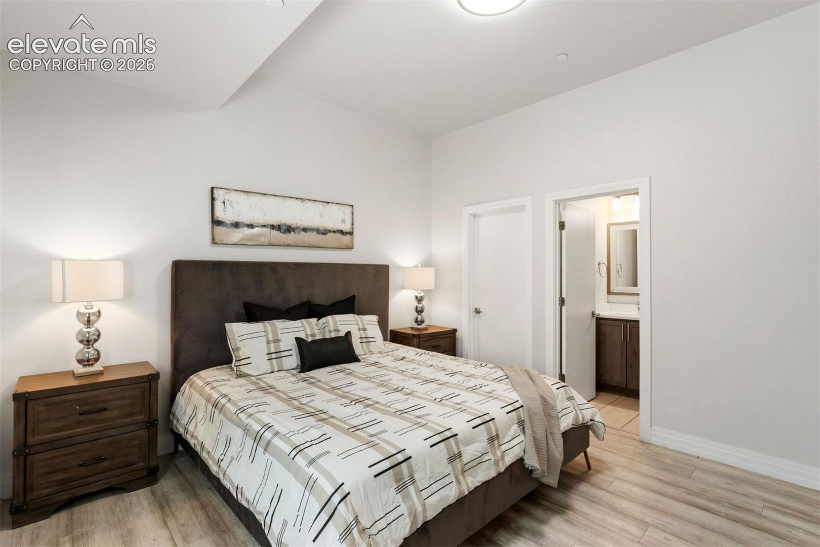 Basement bedroom with ensuite full bath and walk-in closet