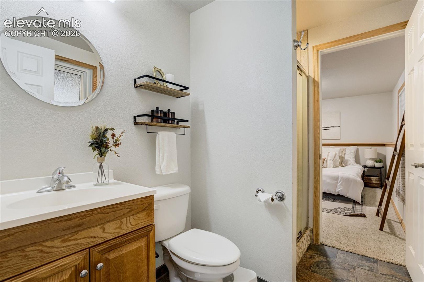 Jack-&-Jill bathroom with shower on the lower level. 