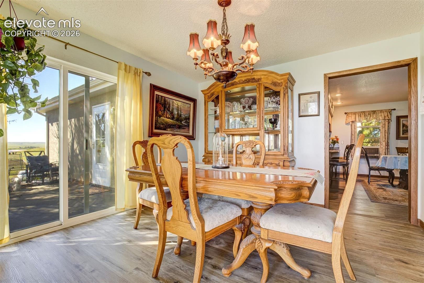 Brand new LPV flooring. Beautiful dining room.  Walk out to the deck.