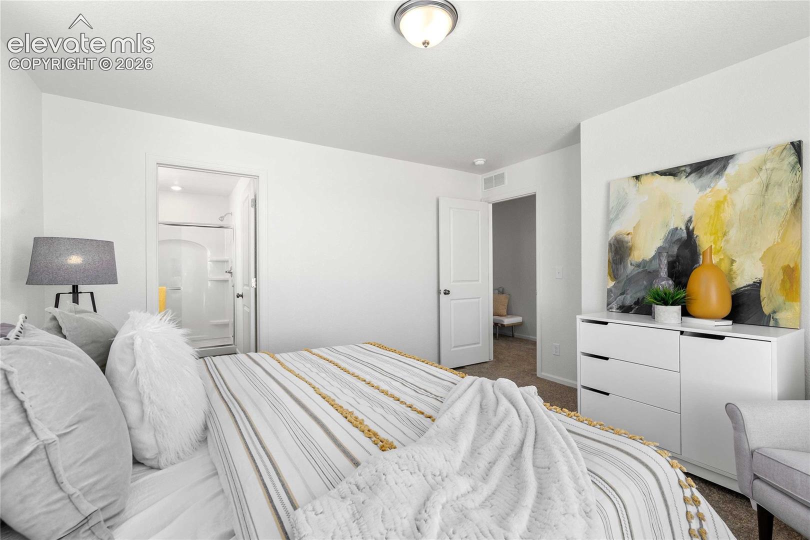White interior walls with a flush-mount ceiling light
*photos  of a model home*