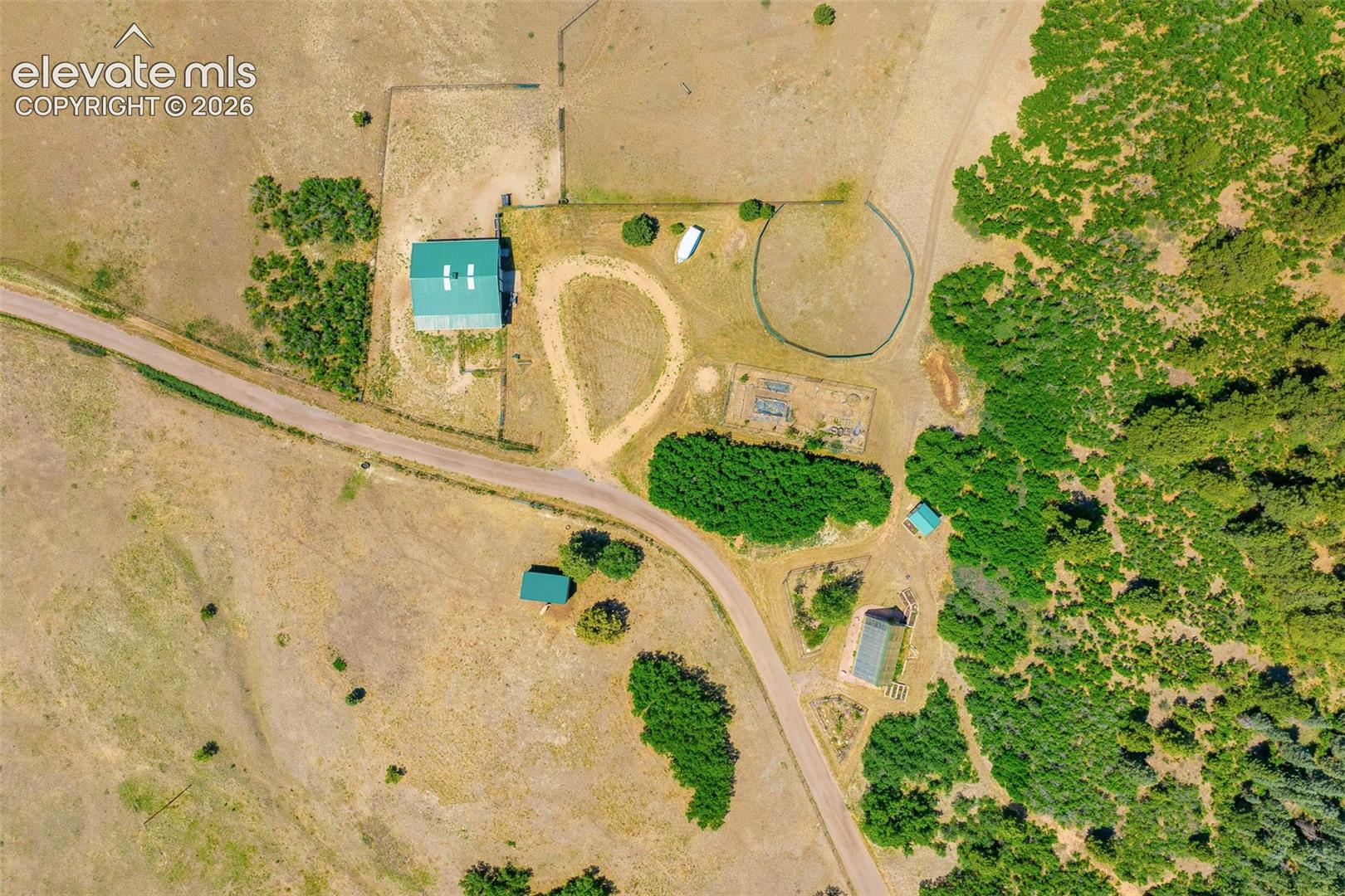 Aerial view of stable photographed June 2026