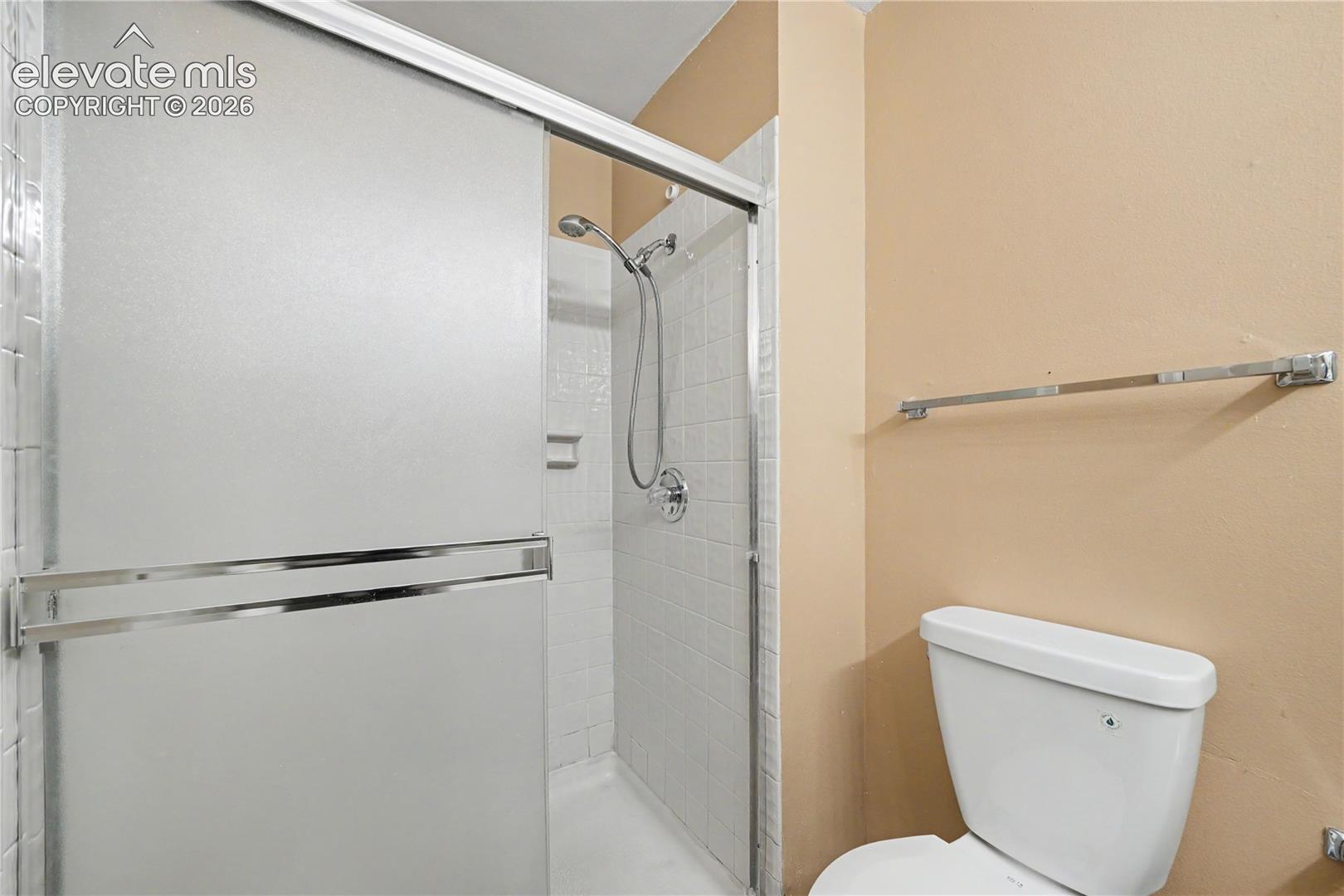 Bathroom with tiled shower area
