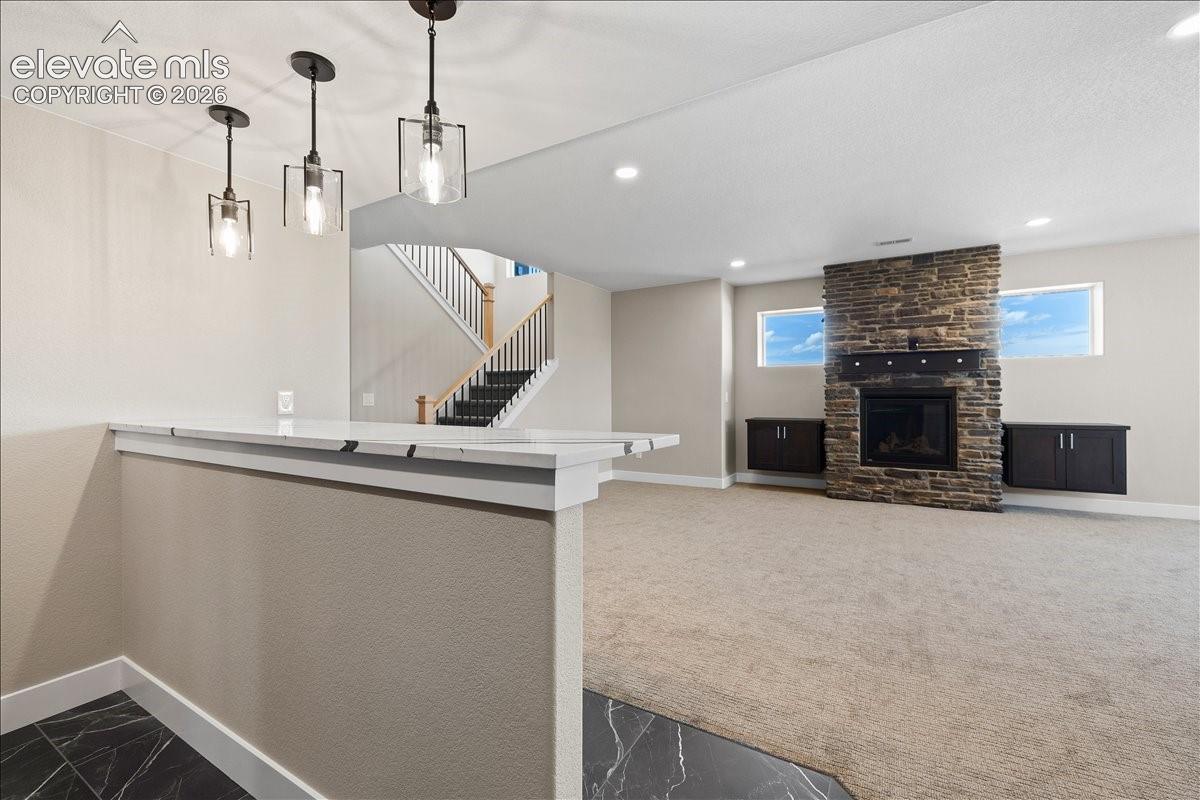 This is the same floor plan, built by the same builder, in the same neighborhood. Finishes will vary based on buyer's custom selections.