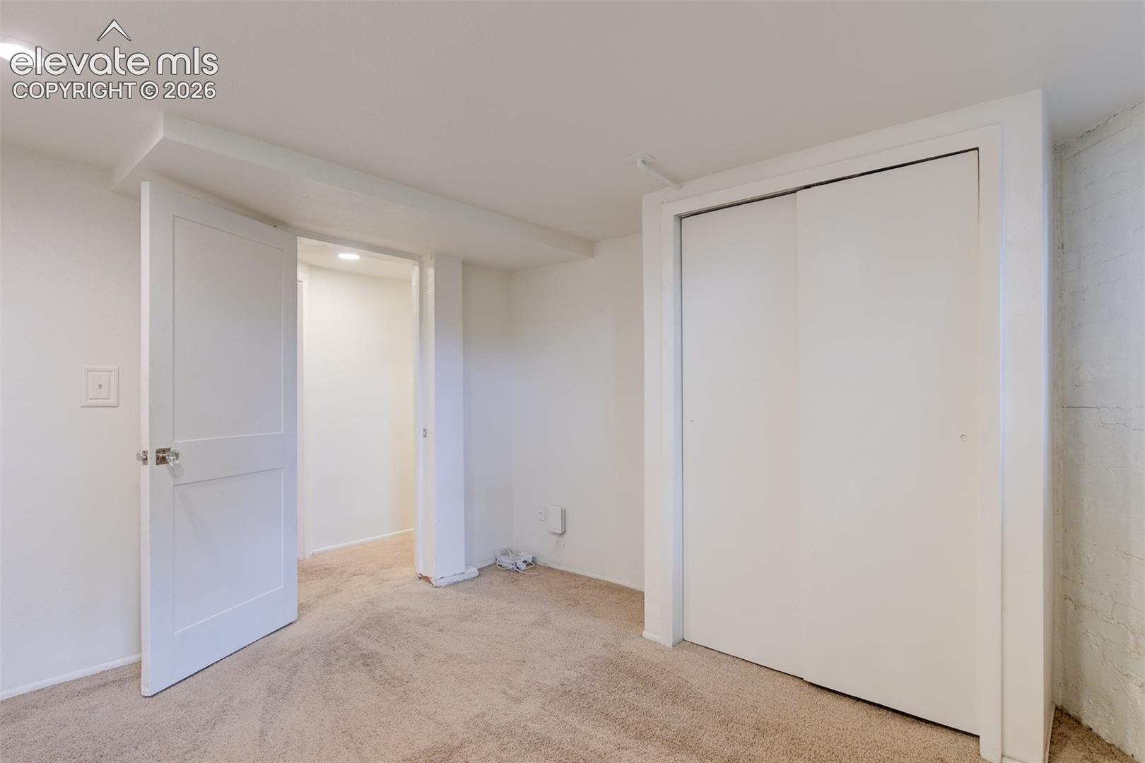 Basement unit located in the back of the property 