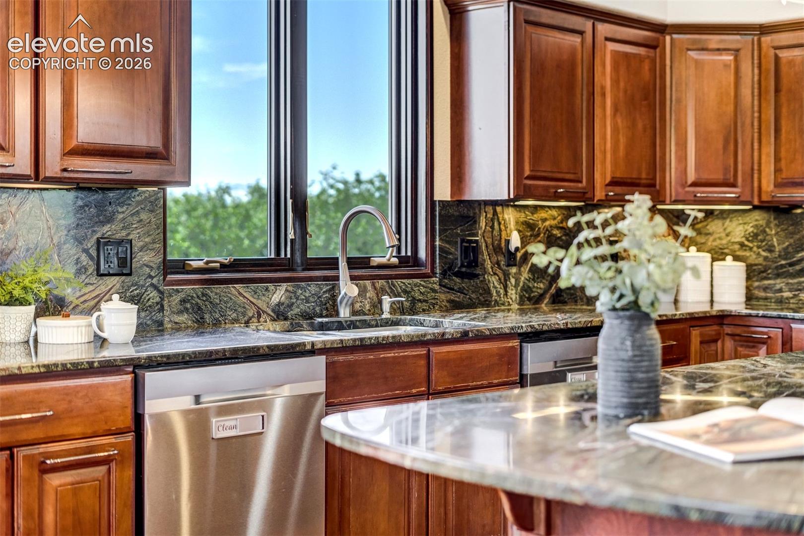 Three prep sinks, two dishwashers, and enough space for family members to clean up. 