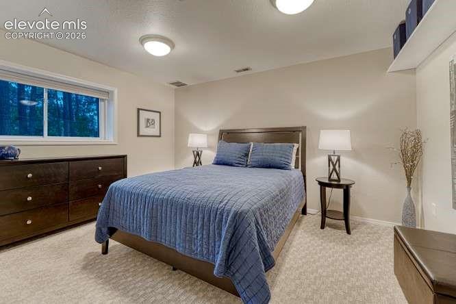 bedroom 5 in basement with garden level window
