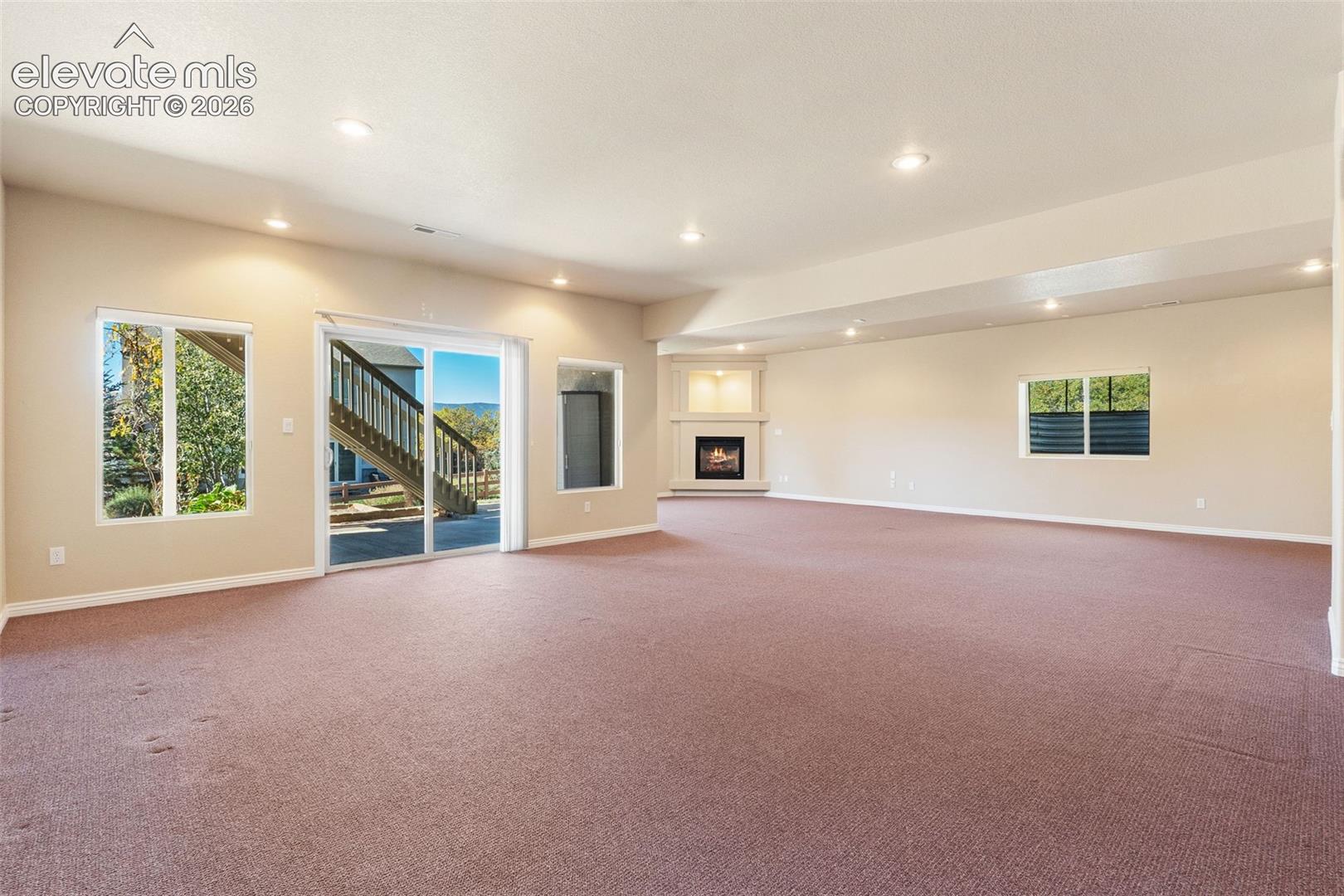 SPACIOUS BASEMENT HAS WALK OUT AND COVERED PATIO