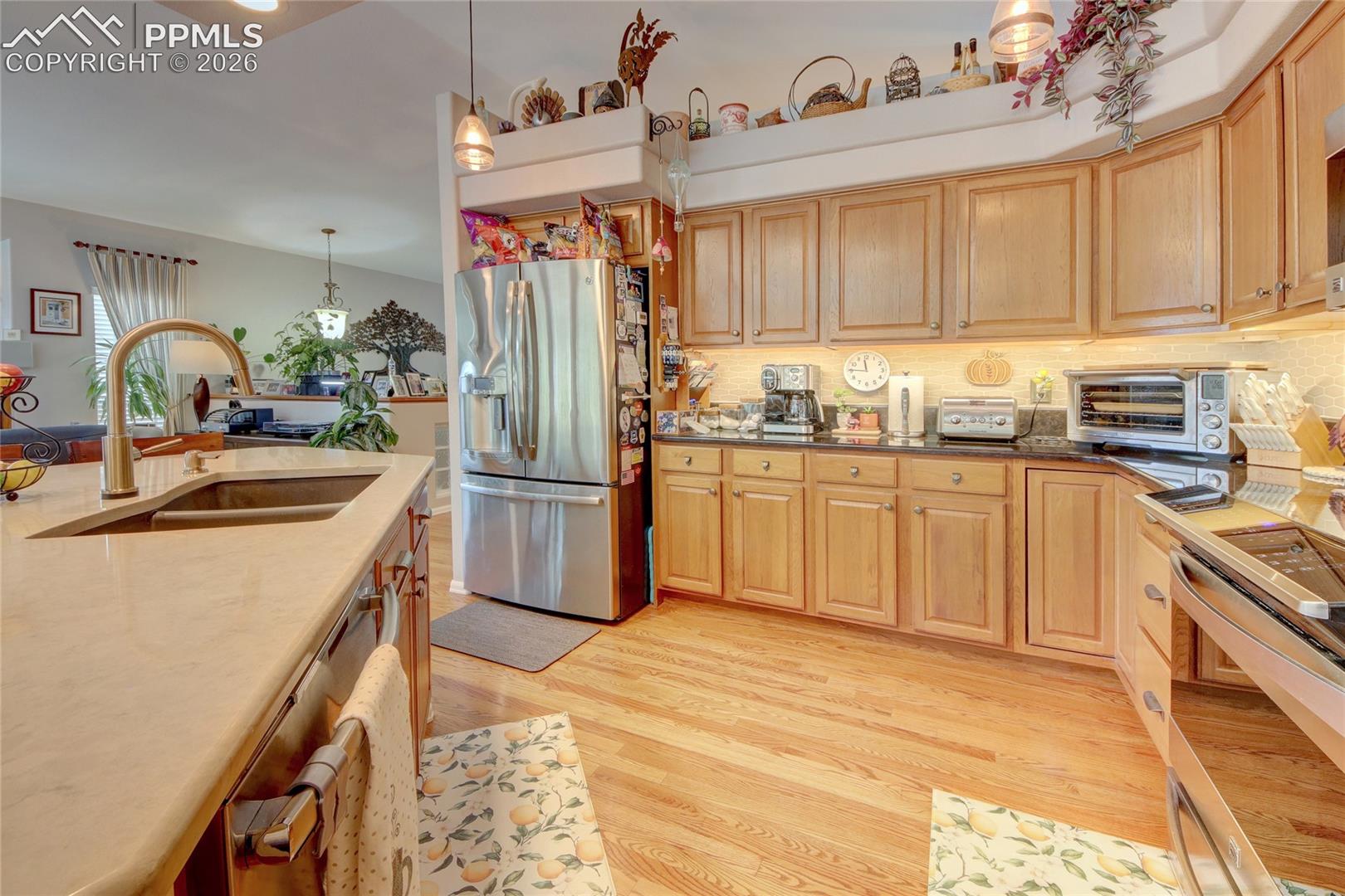 Kitchen stainless steel appliances and subway tile backsplash