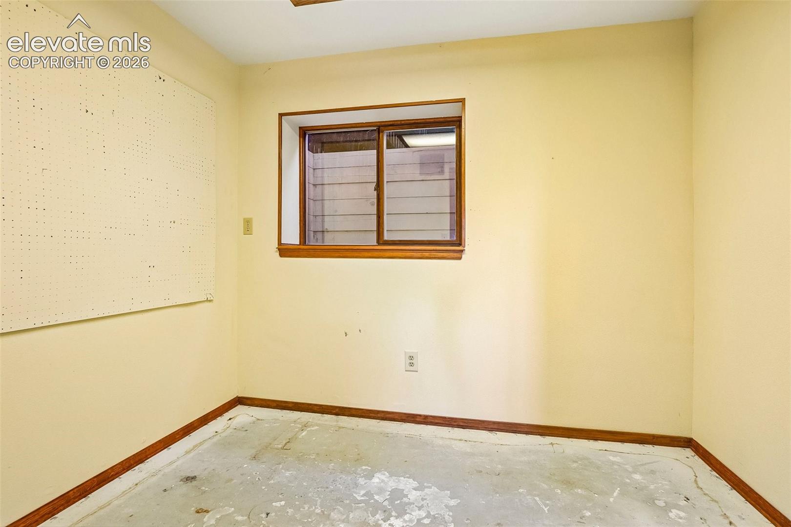 The basement features a space that could be for crafts, workshop or storage.