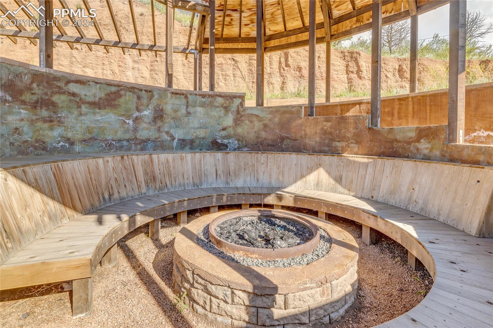 View of terrace with a fire pit