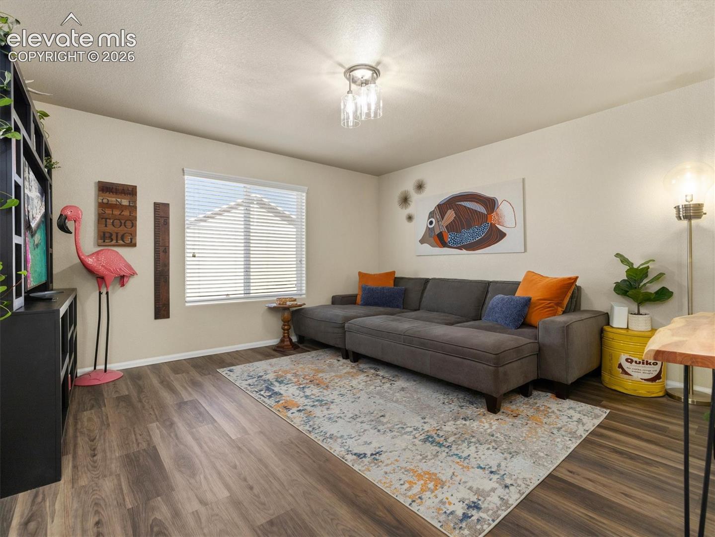 LVP flooring, and a flush mount light fixture