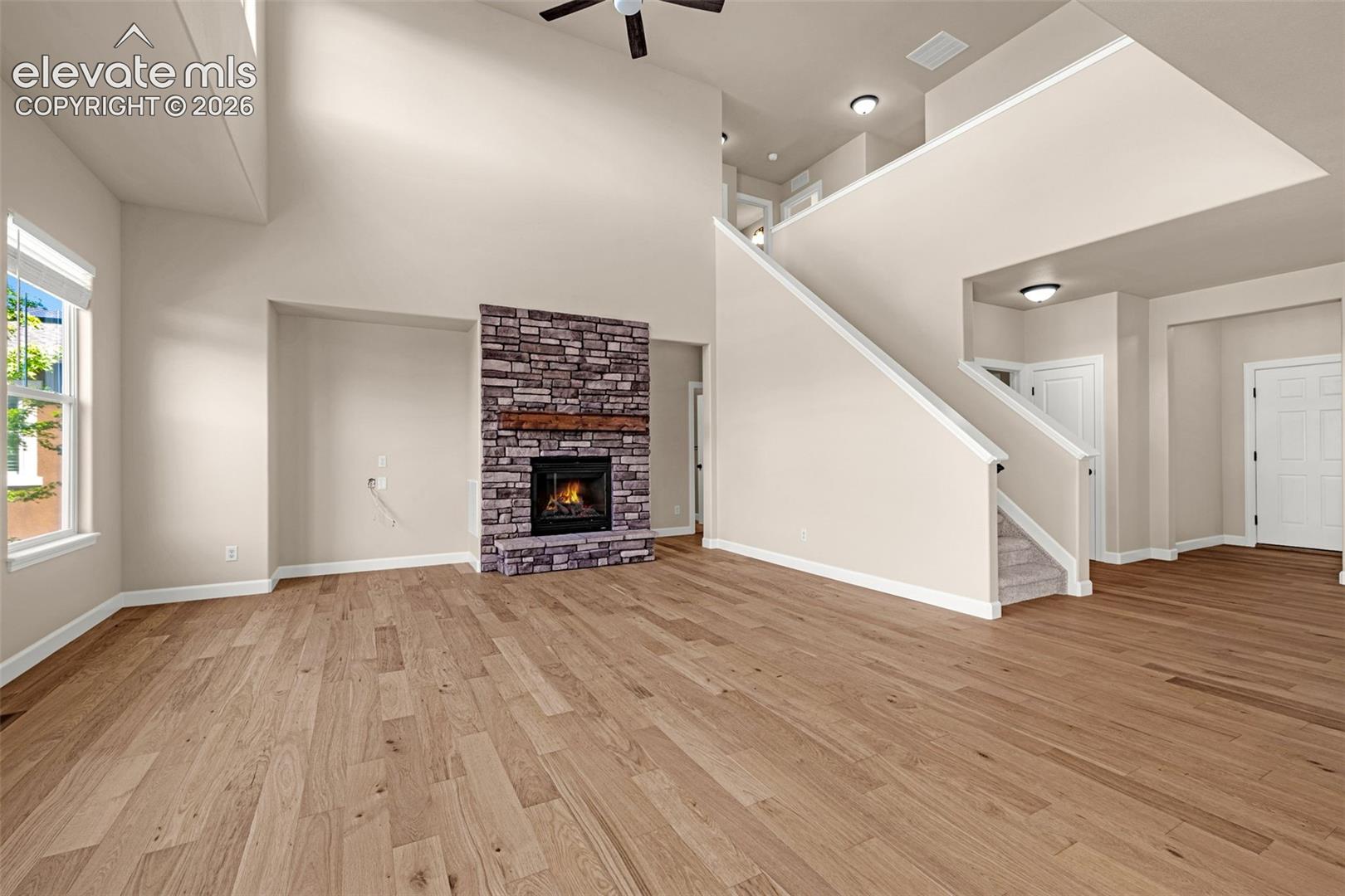 Great Room has gas log fireplace; perfect for the Winter months coming. Steps away from a full bathroom and Office.