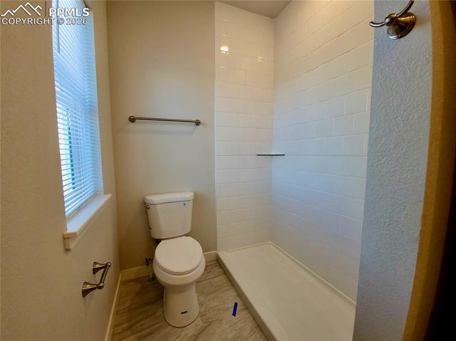 Walk-in shower with tile surround