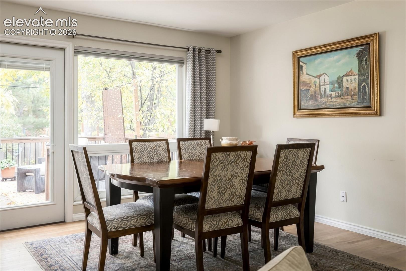 Generous windows and walkout to deck