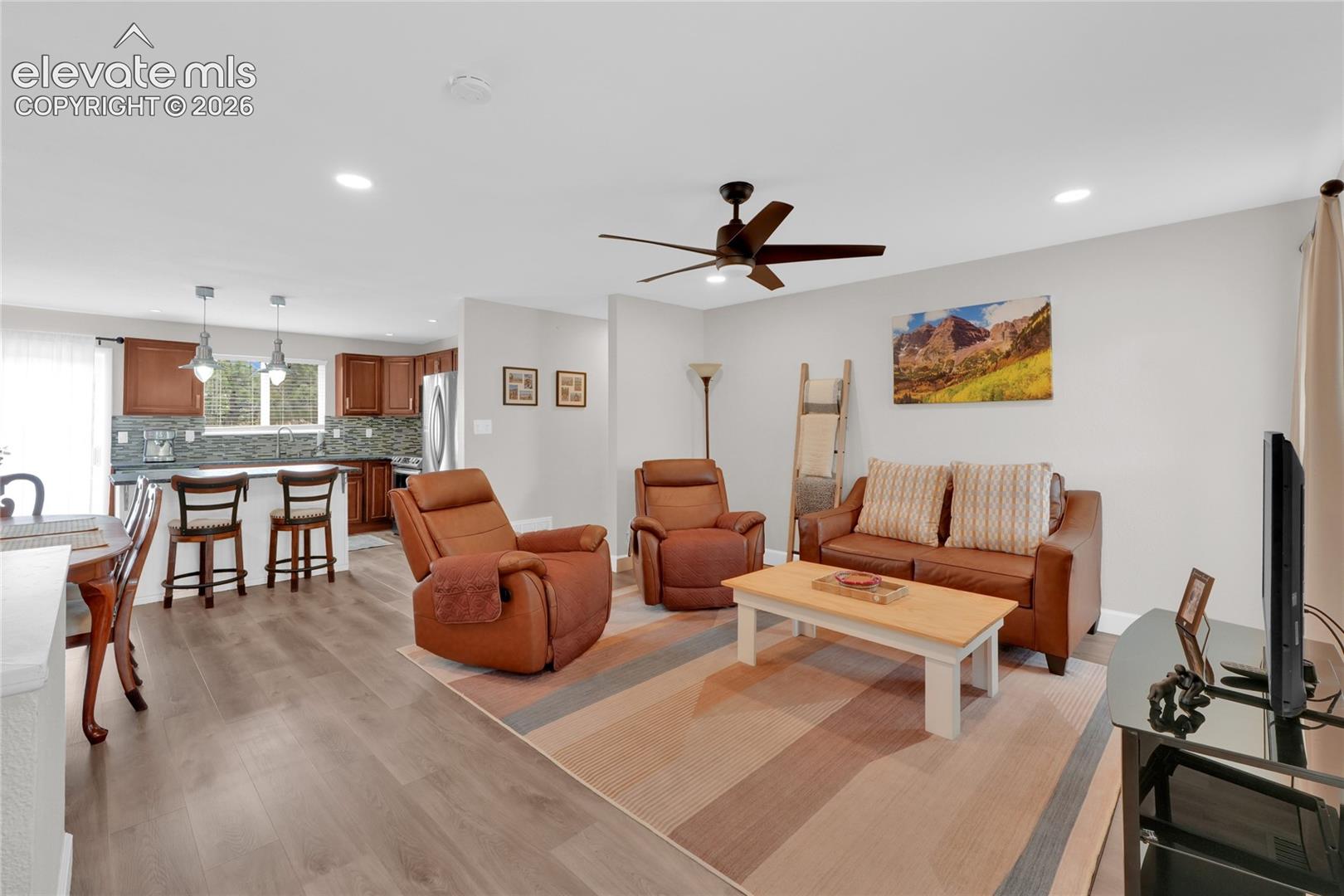 Open concept upper floor with recessed lighting throughout. 