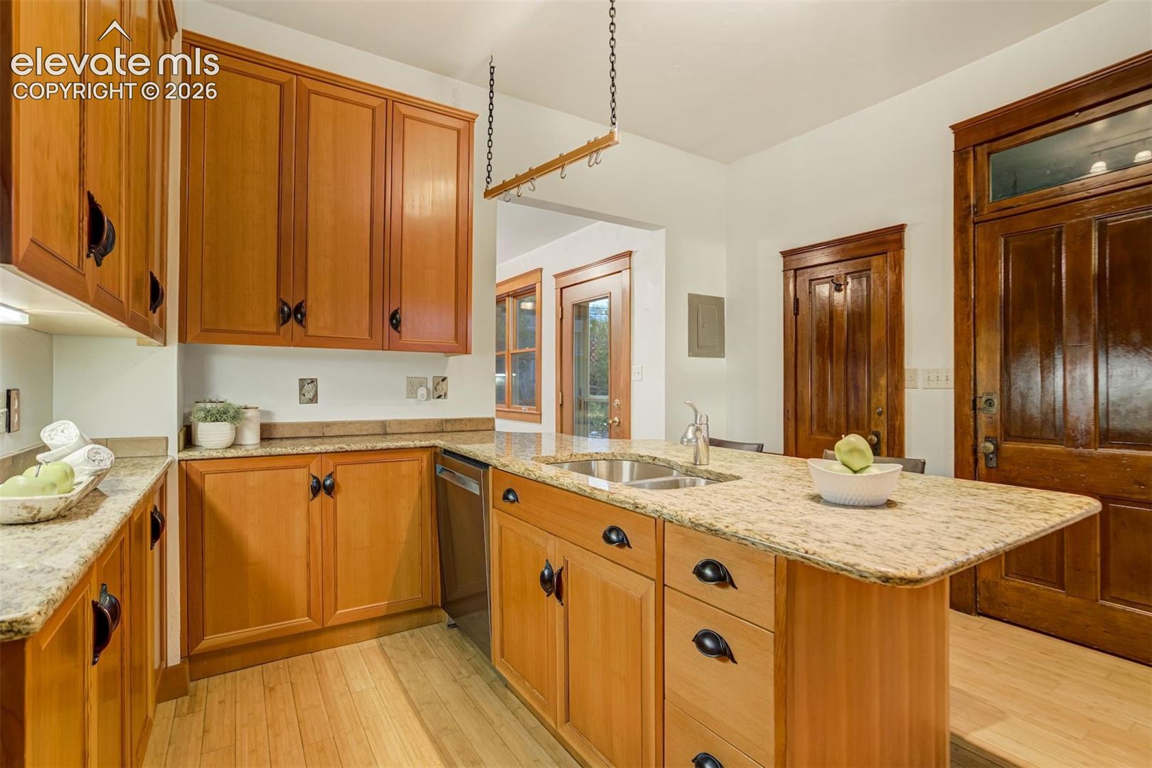 Updated kitchen has lots of TALL cabinets for plenty of storage
