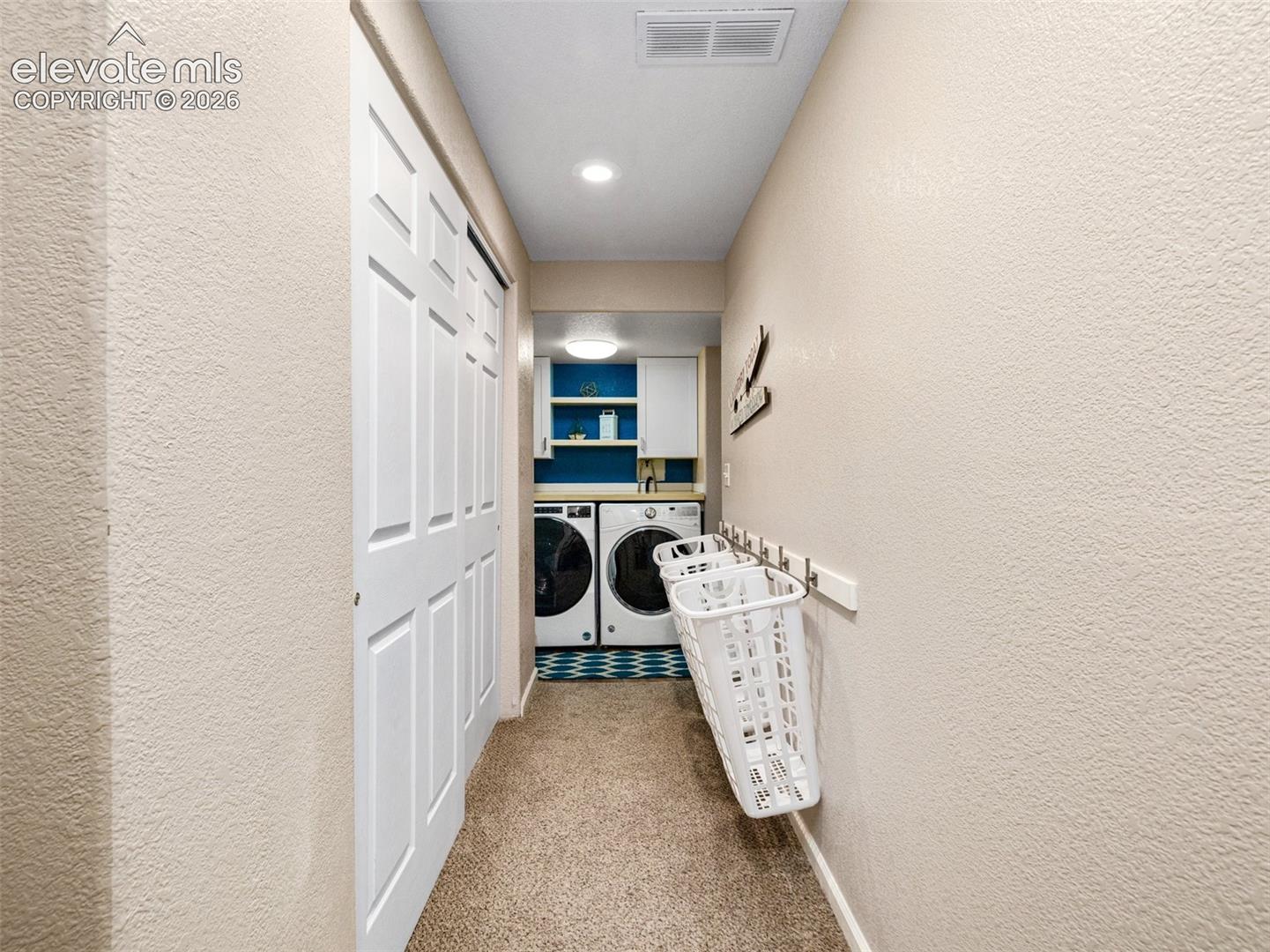 There is an additional laundry hook up in the kitchen pantry