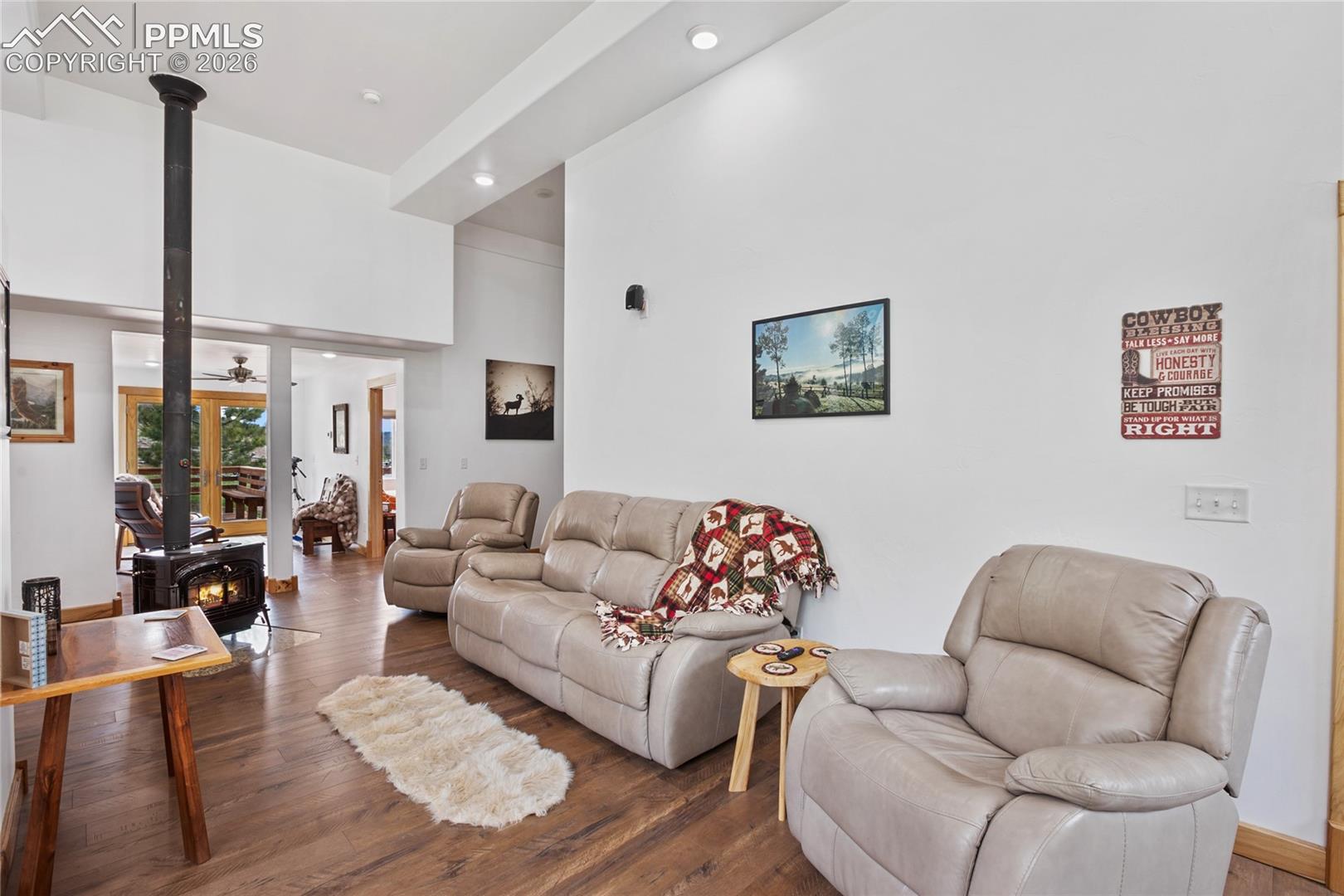 A spacious family room to enjoy the fire!