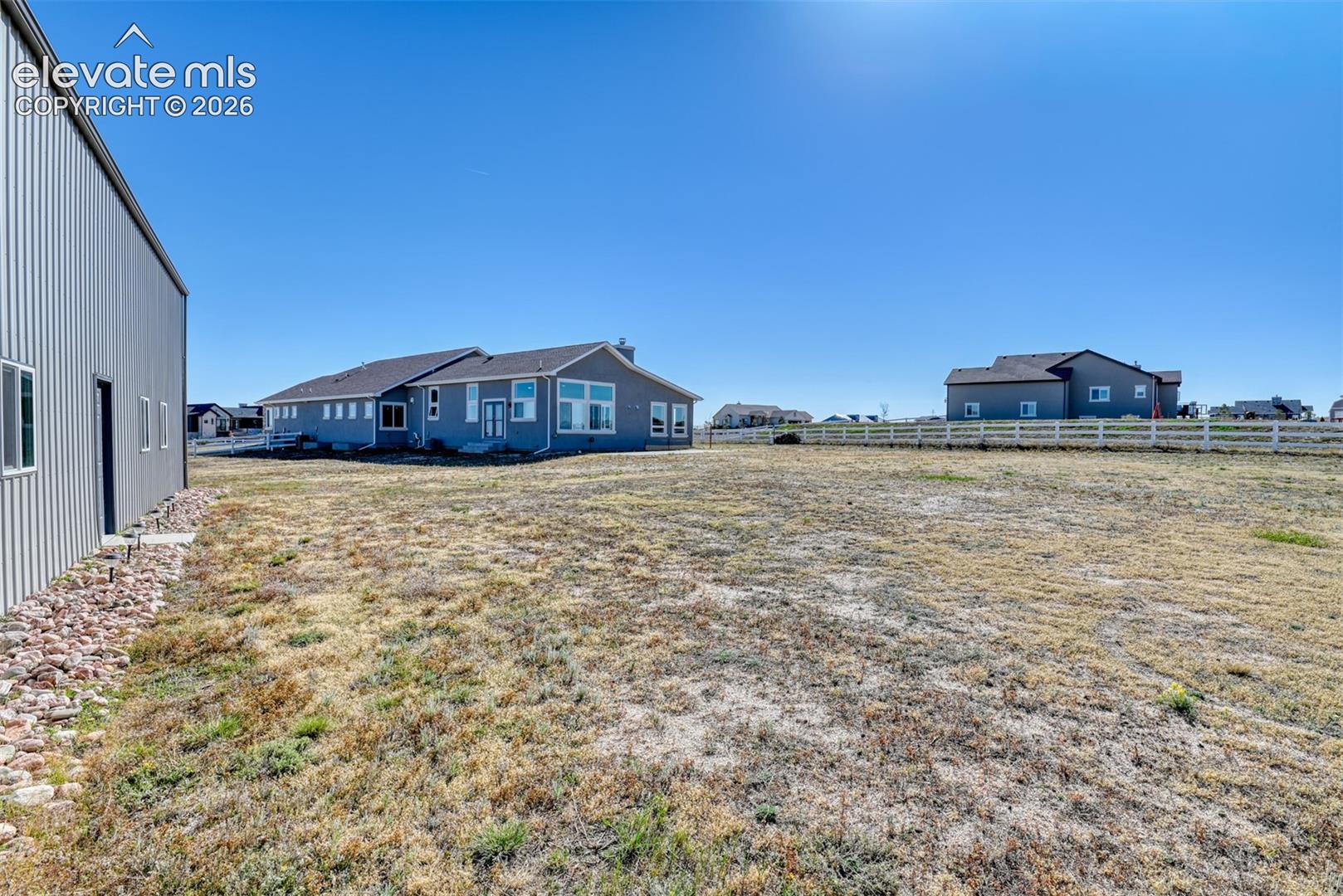 Expansive outdoor space featuring a large pole barn and RV pad with Hook ups.