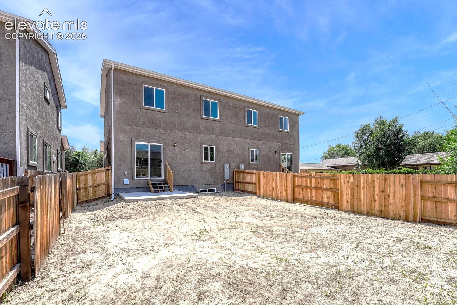 Sizable backyard is fully fenced for privacy and pets.