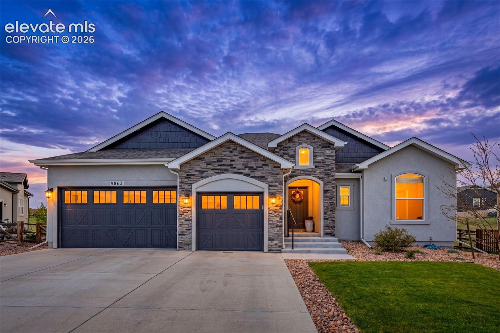 Welcome to this exceptional 6-bed, 4-bath home, offering 4,432 square feet of beautifully designed space. Perfectly situated on a quiet cul-de-sac backing to open space and scenic walking trails, this home showcases stunning mountain views and easy access to nearby amenities including golf, fitness facilities, and a community pool. Step inside to vaulted ceilings, massive bay windows bringing in abundance of natural light that create a warm yet sophisticated atmosphere. The impressive kitchen and great room are truly the heart of the home featuring a floor to ceiling stone fireplace. The thoughtfully designed main level features four spacious bedrooms, including a luxurious primary suite that feels like a private retreat. The spa-inspired ensuite bath boasts a freestanding soaking tub, oversized frameless glass shower with rain showerhead, custom closet cabinetry, and designer finishes throughout. Two secondary bedrooms share a convenient Jack-and-Jill bathroom, providing both comfort and functionality. The gourmet kitchen is beautifully appointed with premium stainless-steel appliances, including a 5-burner gas cooktop, double ovens, convection microwave, oversized refrigerator, and pot filler. Quartz countertops, custom cabinetry, designer lighting, stylish backsplash, and Moen fixtures complete the upscale culinary space. Just off the kitchen, the dining area opens to an expansive deck with dual staircases leading to a private backyard oasis featuring tranquil views and a custom putting green. The fully finished lower level is built for entertainment and relaxation, offering a private theater room, arcade/game space, hidden built-in dog kennel, two oversized bedrooms, and an impressive bar area perfect for hosting gatherings. Completing the home is a dream garage with premium lighting, floors and cabinetry. Blending luxury, comfort, and exceptional craftsmanship, this remarkable property offers an unmatched lifestyle in a truly picturesque setting. Welcome Home!