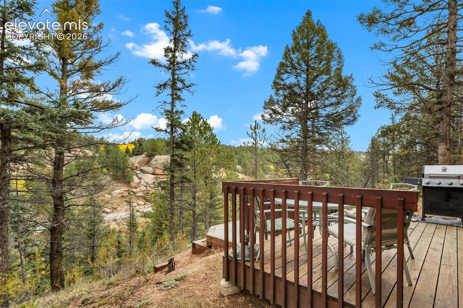 Hardwood deck with wood railing