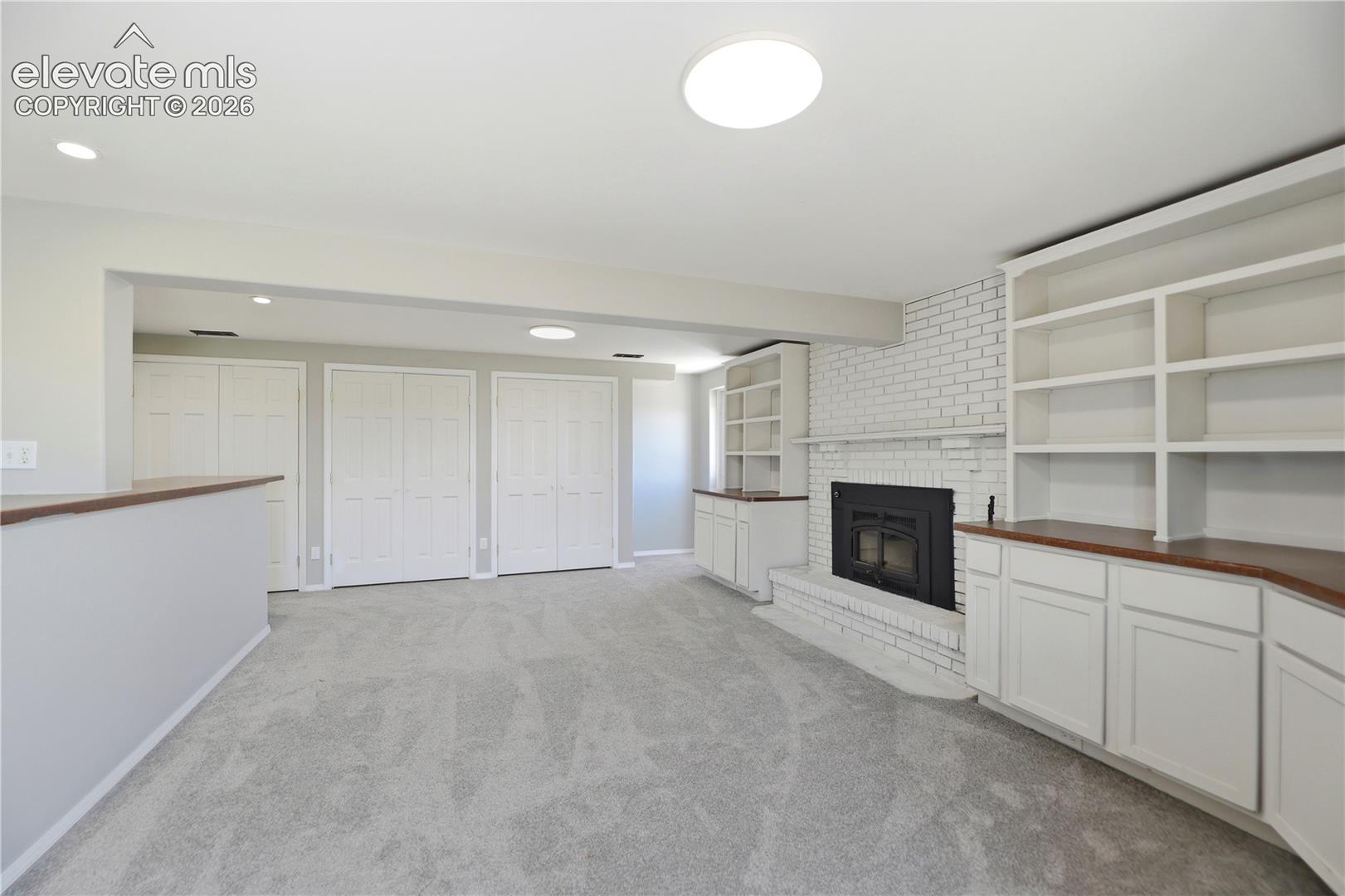 Carpet, Closets, Built Ins, Fireplace, Dry Bar