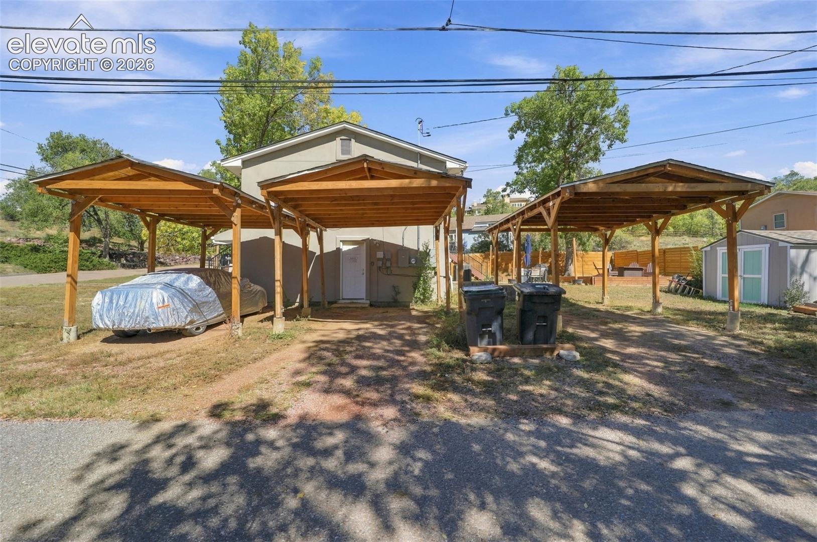 The property has  3 separate carports for  parking!