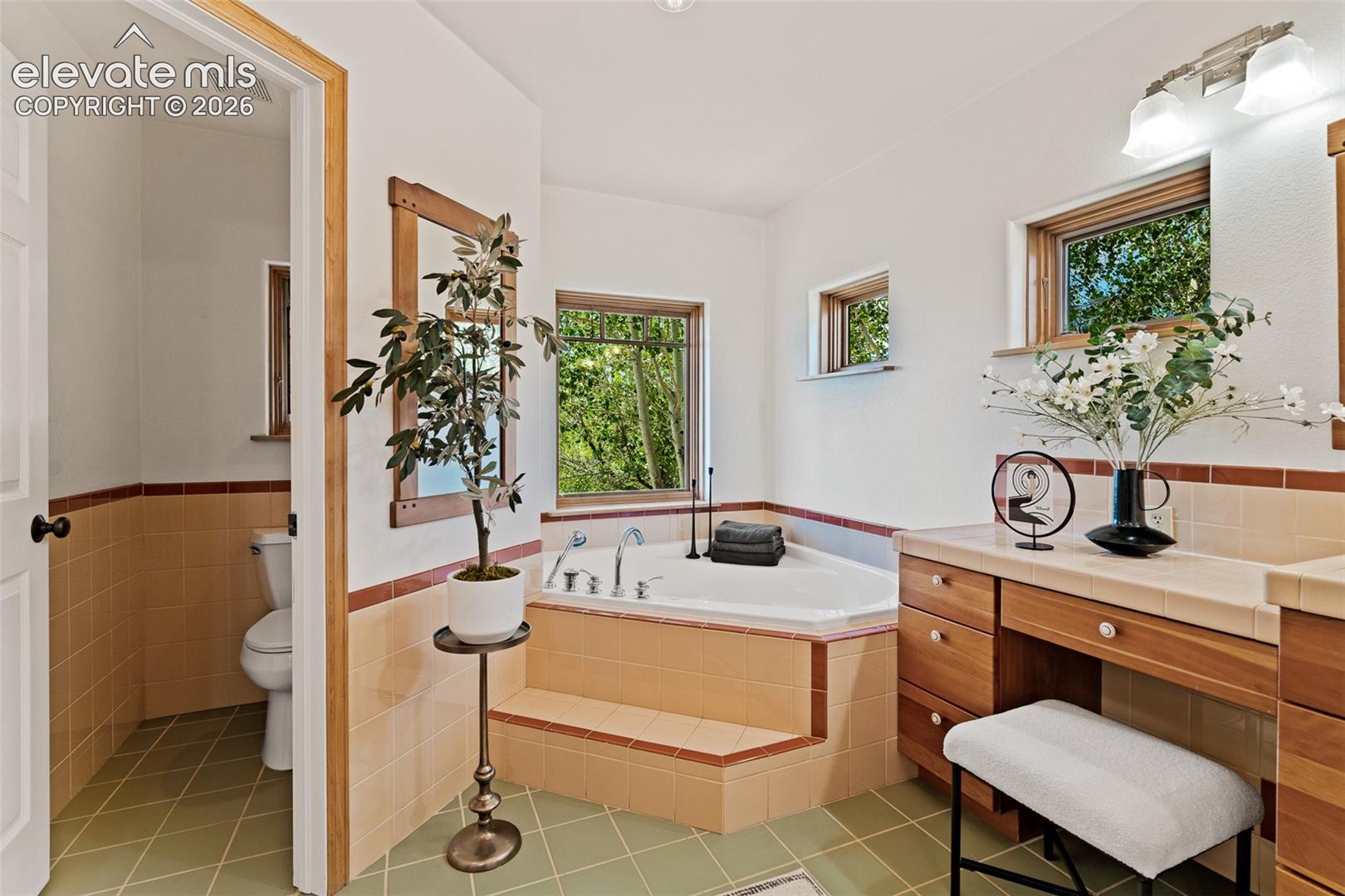 Primary bathroom photographed June 2026