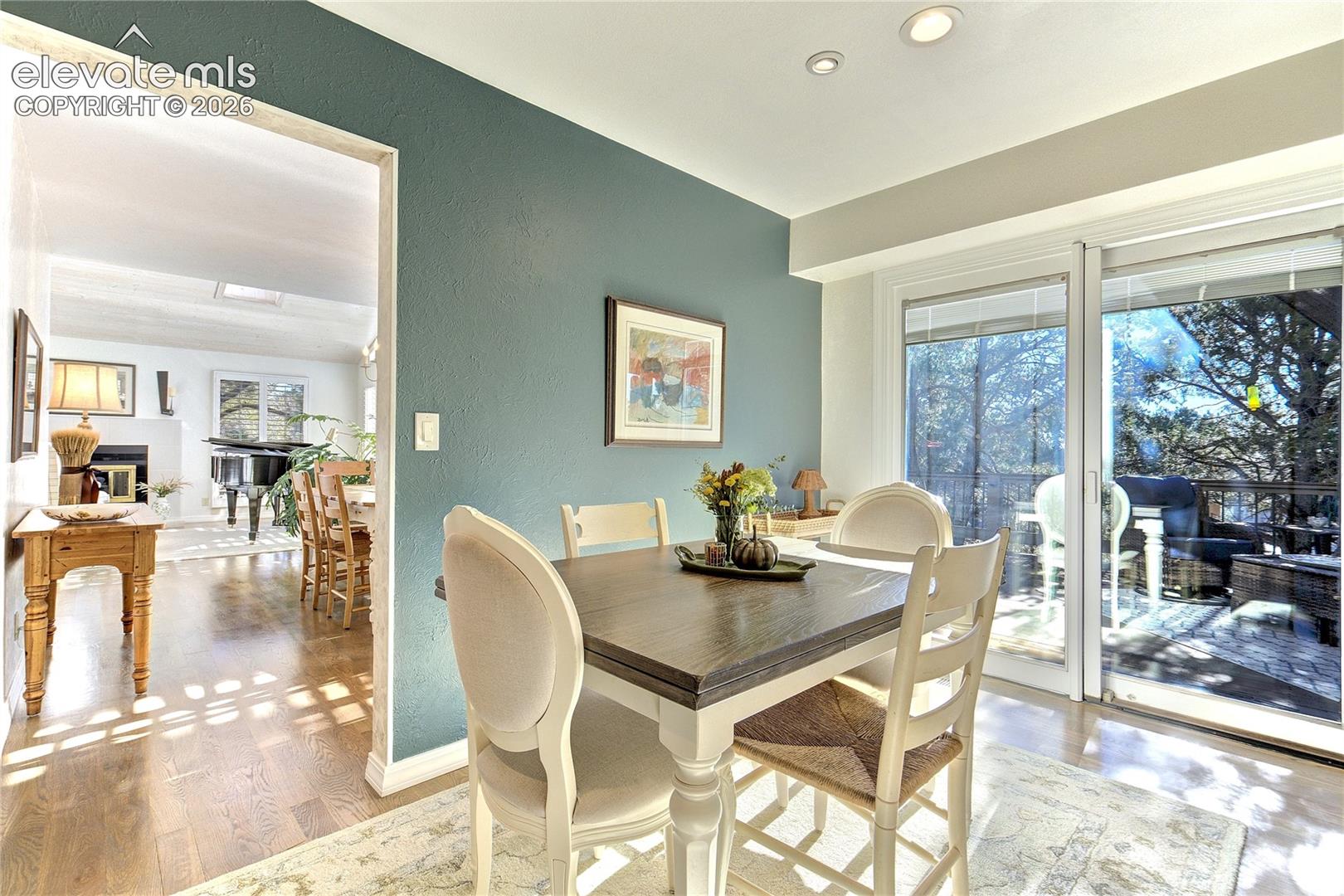 Morning light, mountain glimpses + easy deck access make this an inviting place to begin the day.