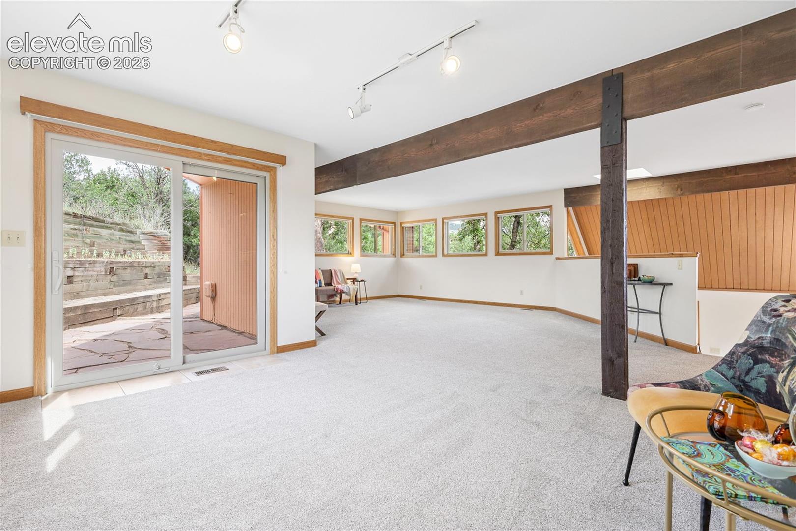 The spacious dining room accesses the roomy flagstone patio.  