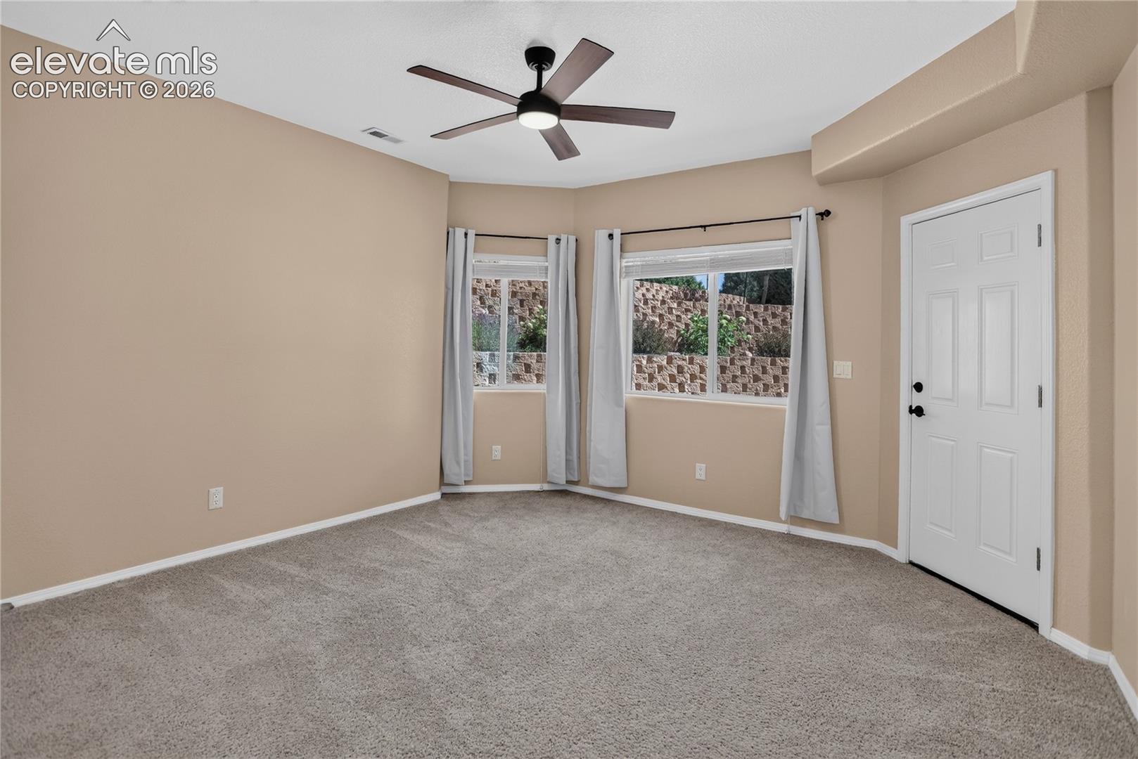 Bedroom 4 w/ walk-out to patio - lower level