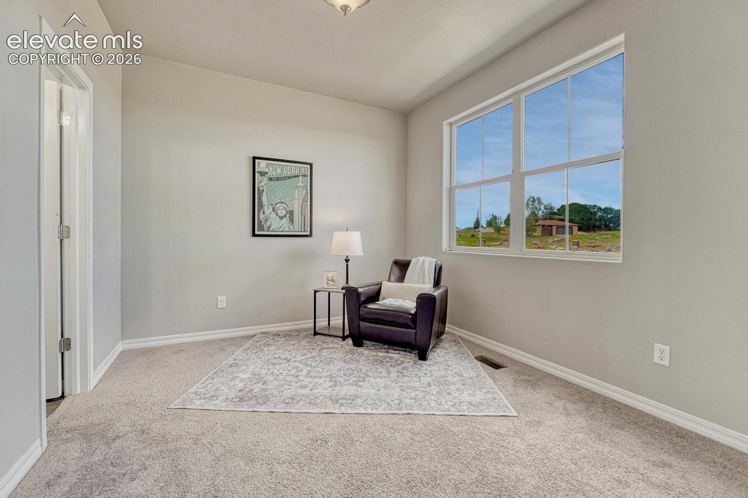 Upper level Bedroom #2 could also be used as a home office, or sitting room.