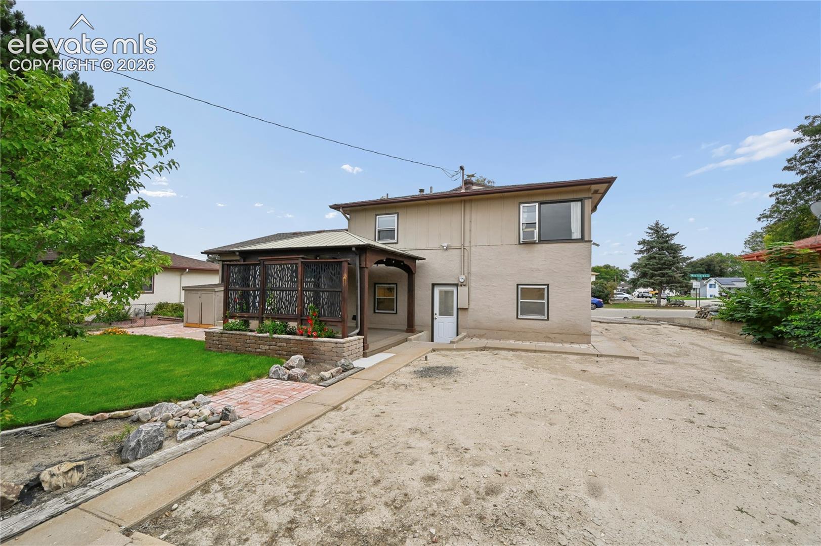 Backyard with Space for Parking or Your Next Project!