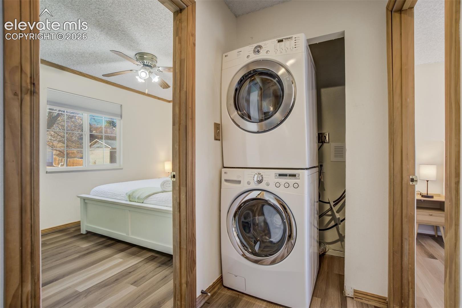 Stacked laundry appliances within a dedicated recess