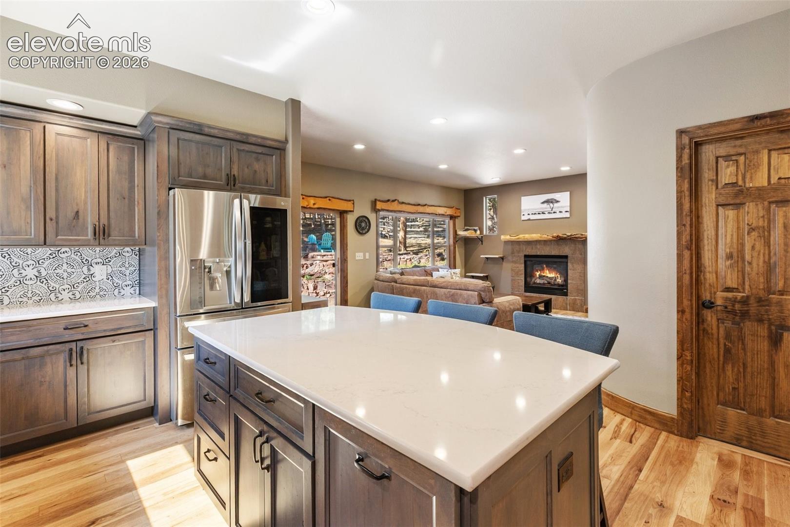 Stone counter-tops with matching island.