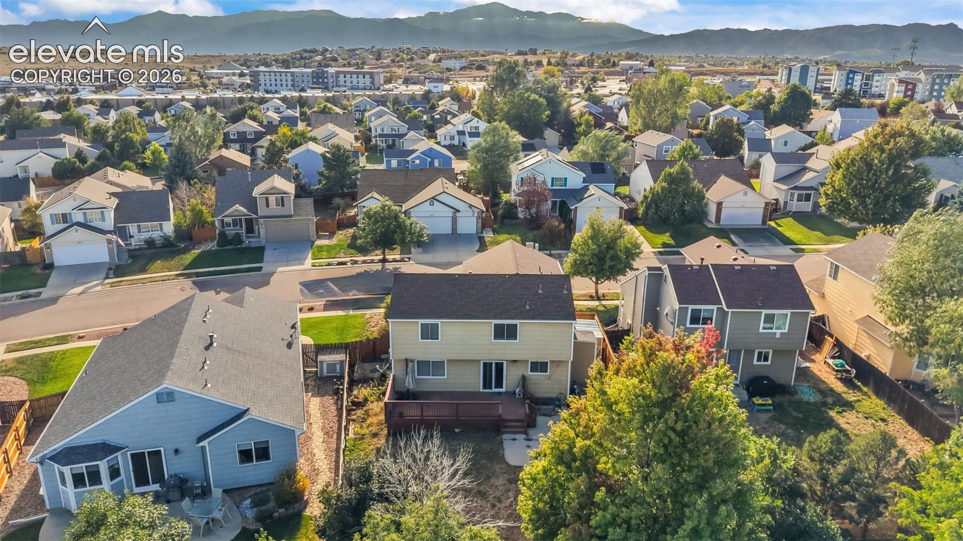 Residential neighborhood with a mountain backdrop
