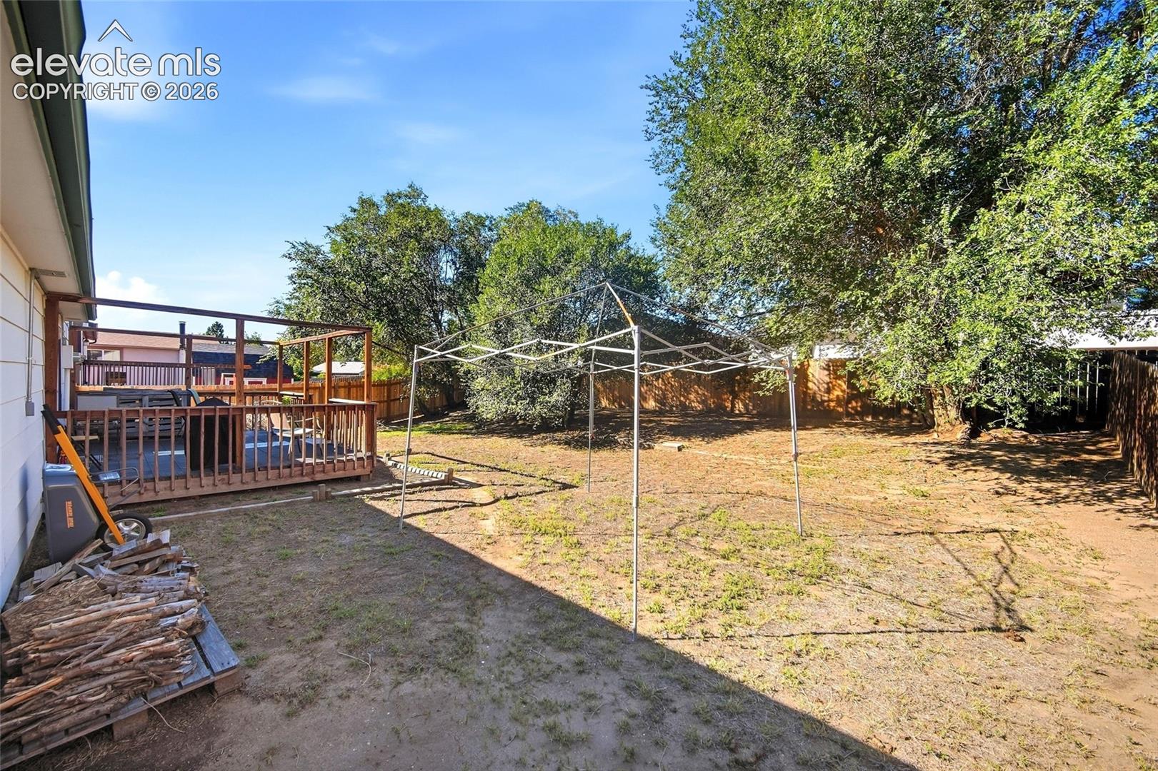 Rear yard with view of rear deck