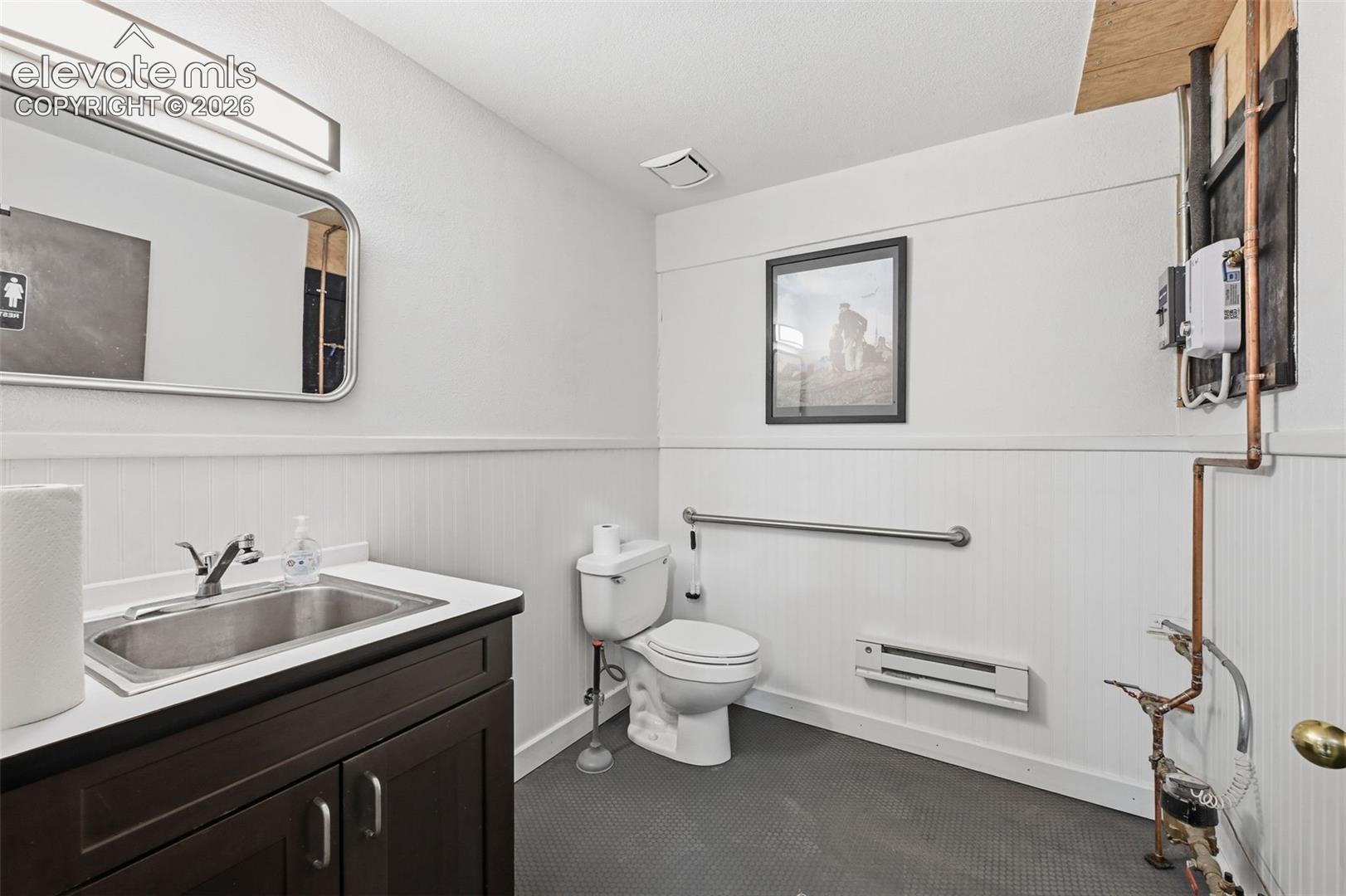 Bathroom: On-site restroom with on-demand hot water