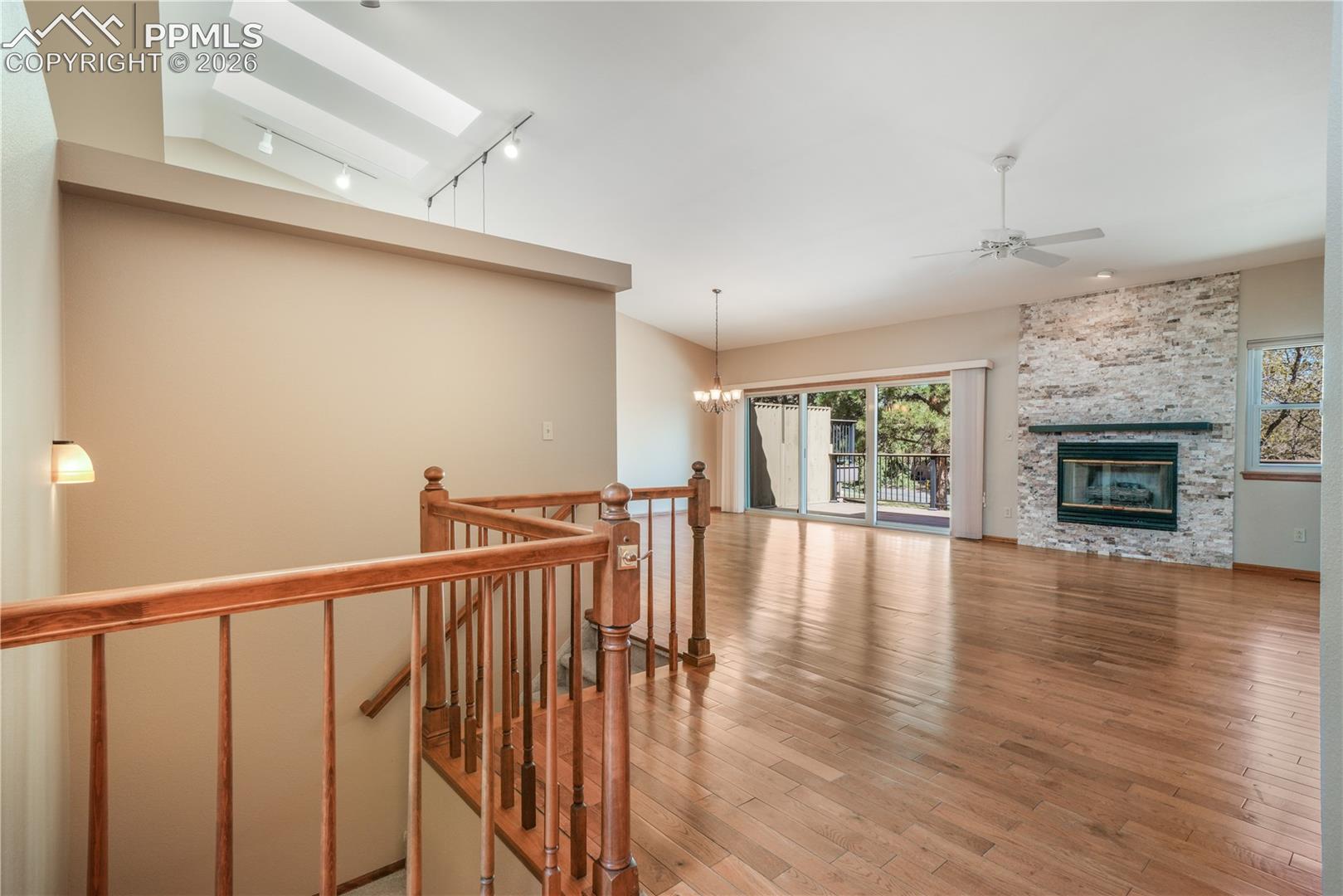 Entry with hard wood floors in open concept