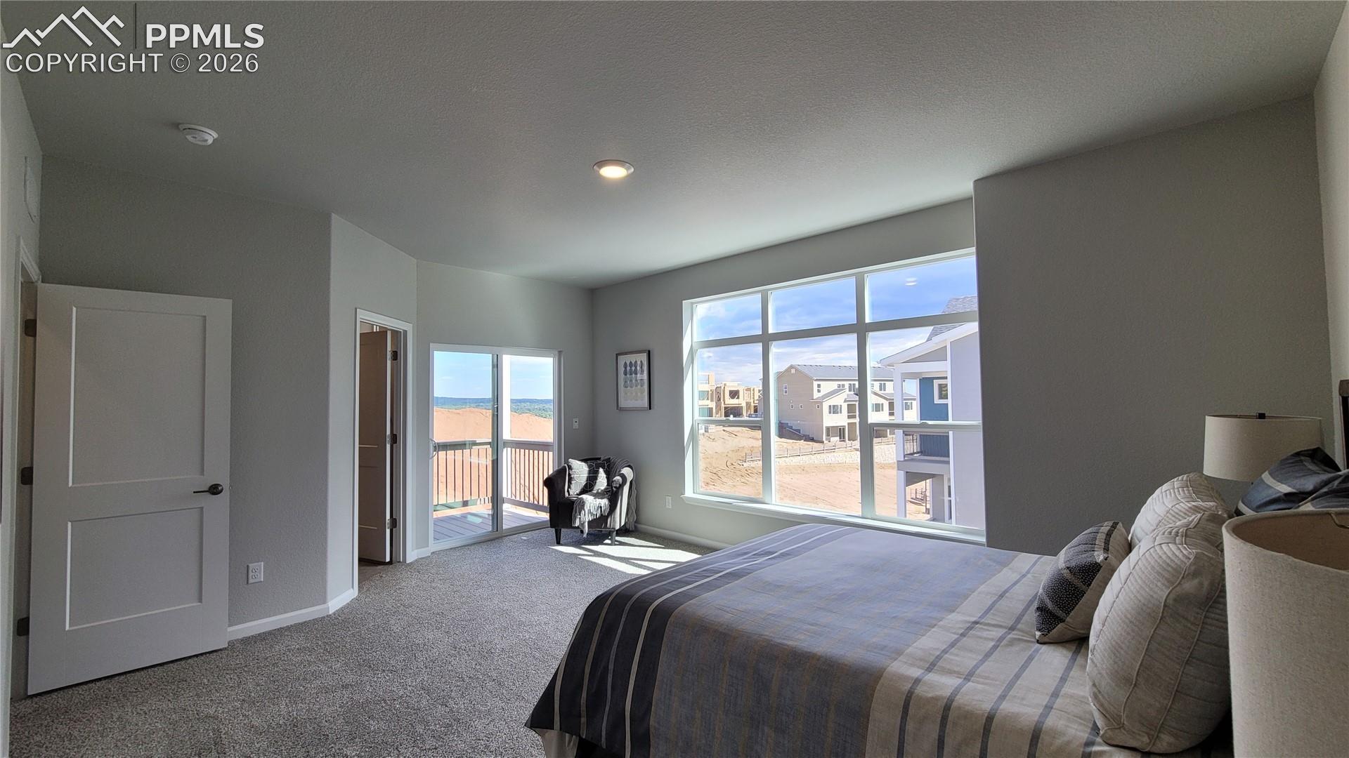 Primary Suite is accompanied with a plush bathroom, walk-in closet, and private deck!