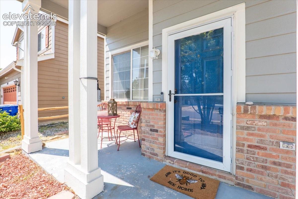 Covered porch for enjoying morning and evening beverages